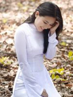 Girl in dry leaves