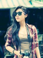 Brunette-Asian-Girl-With-Photo-Camera