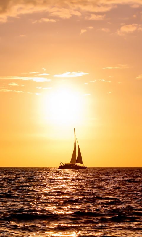 Ship On Sunset Sea