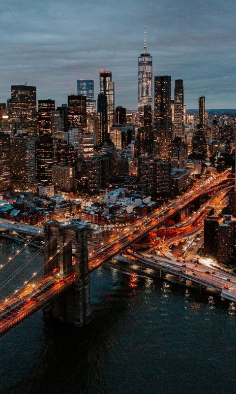 aerial photography of buildings and bridge wallpaper