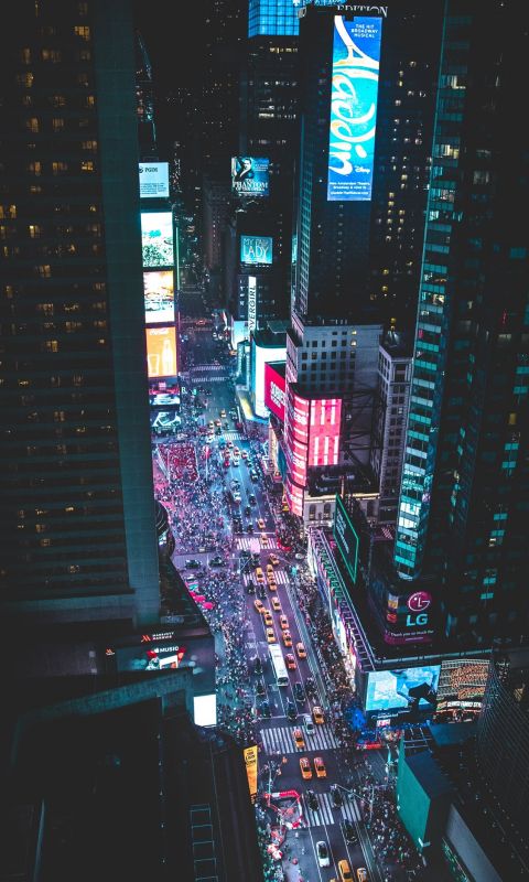 aerial photo of a busy city during night time wallpaper