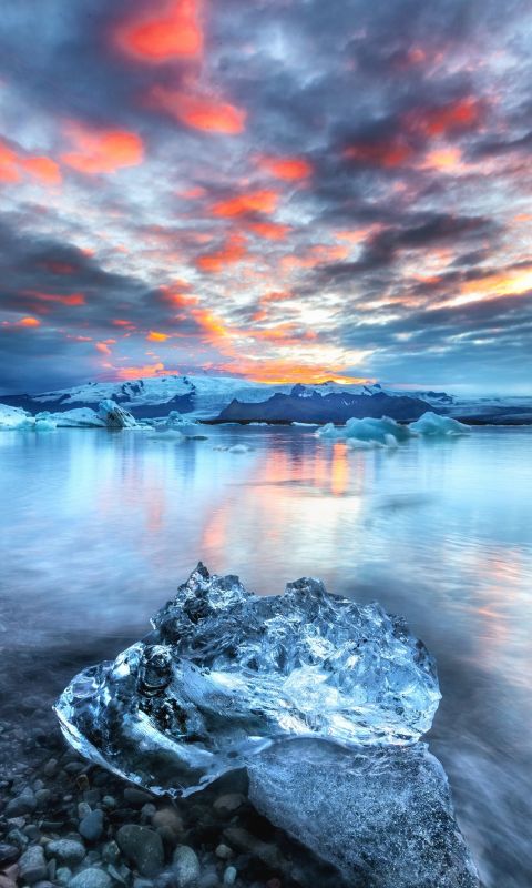 block of ice near water wallpaper
