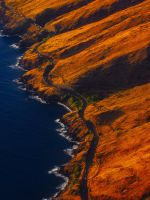 aerial photography of road on mountain near seasho... wallpaper
