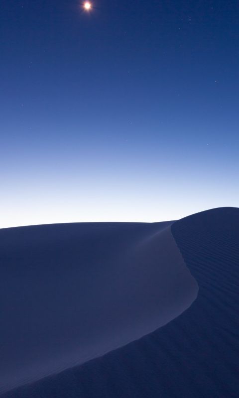 desert field under nig wallpaper