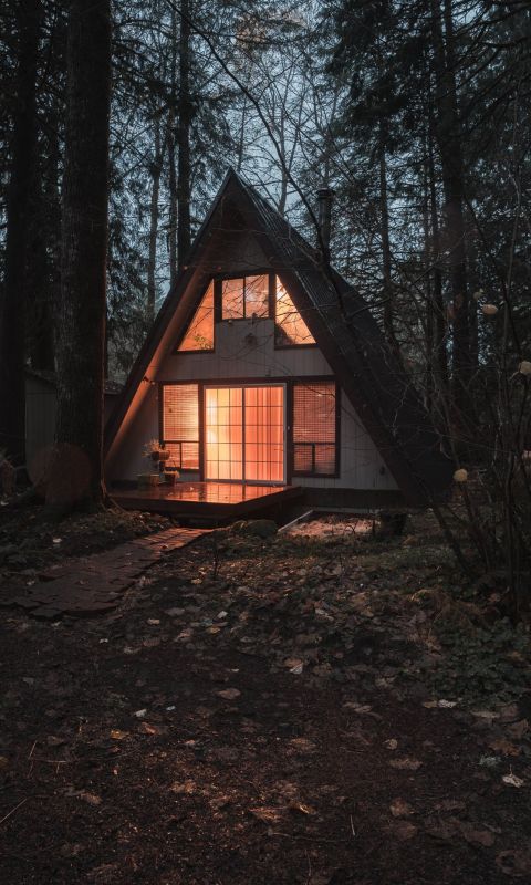 An A Frame home at night in the Mount Hood area wallpaper