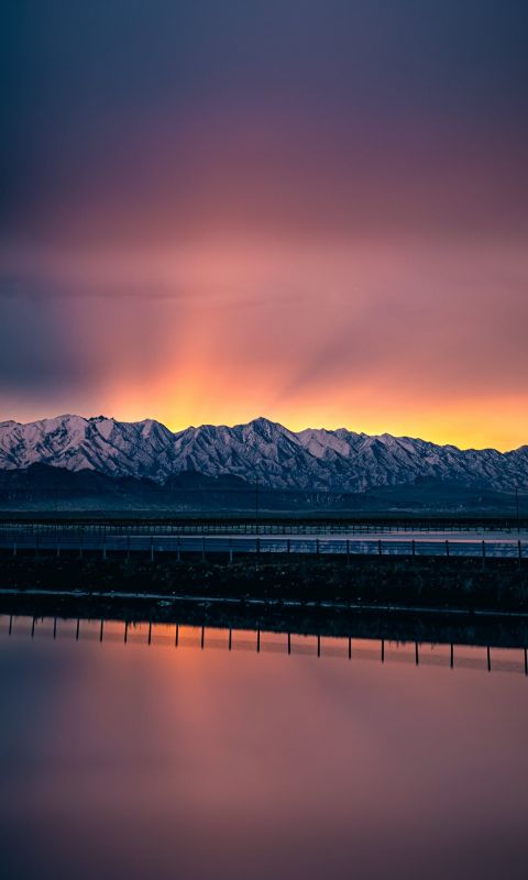A beautiful sunrise coming over Farnsworth Peak ju... wallpaper