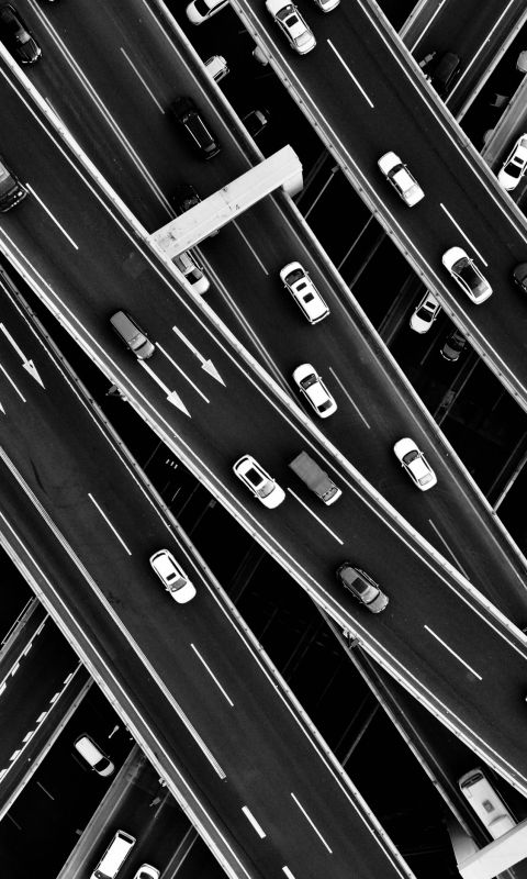 aerial grayscale photography of cars in the street... wallpaper