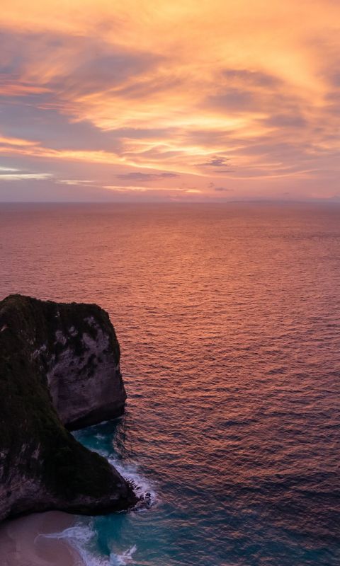 dinosaur shaped island beside sea wallpaper