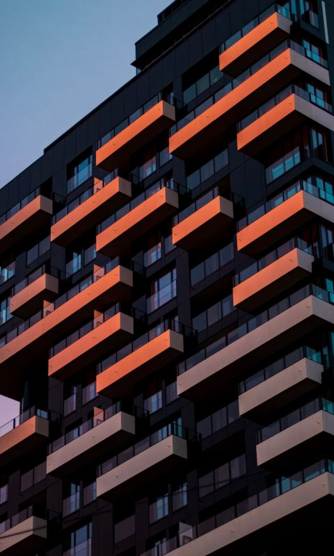 low angle photo of high rise building wallpaper