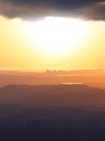 silhouette of mountain during golden hour wallpaper