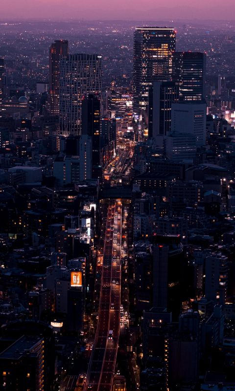 aerial view of city buildings during night time wallpaper