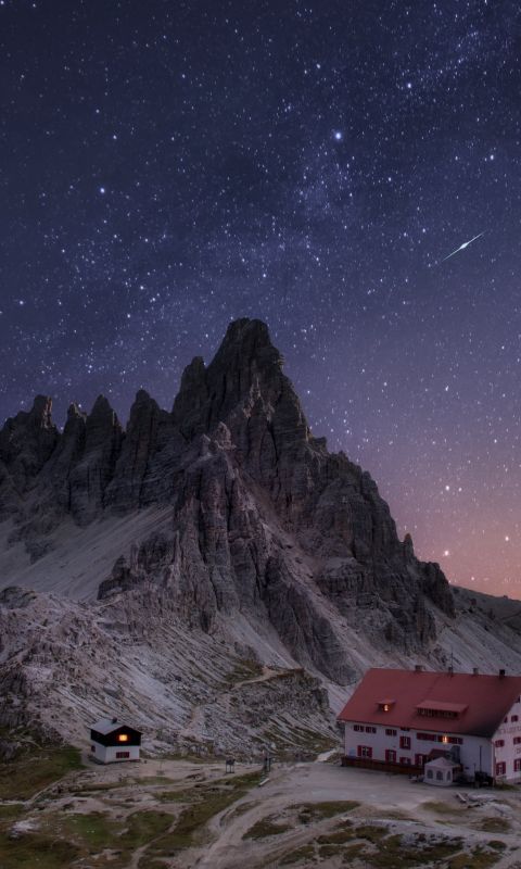 brown and white house on snowcape mountain wallpaper