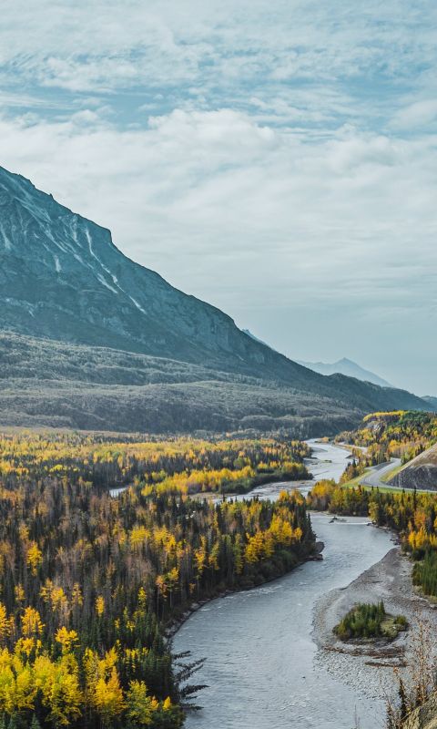aerial photo of mountain under cloudy sky wallpaper