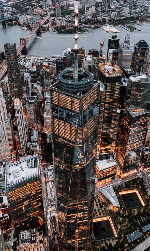 brown and black high rise building wallpaper