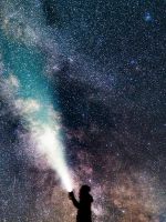 a sefie underneath the milky way wallpaper