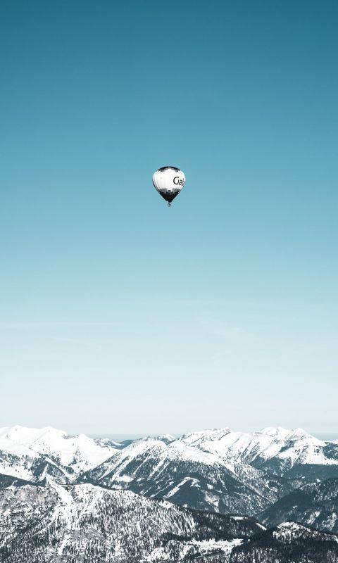 white and black hot air balloons in mid air wallpaper