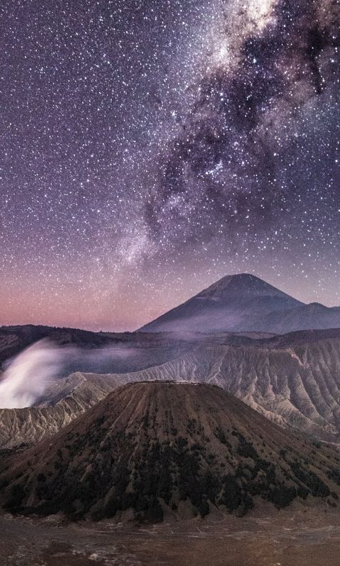 brown volcano under grey sky wallpaper