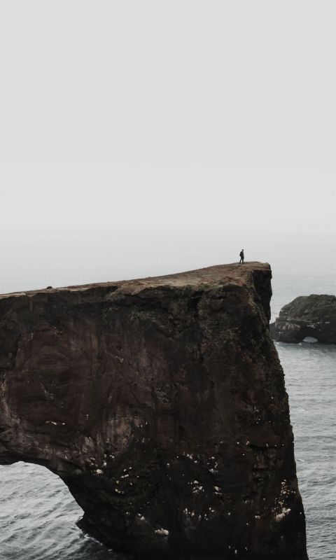 gray rock on body of water wallpaper